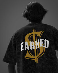 Designosor Earned Never Given oversized black acid wash t-shirt back with bold EARNED graphic