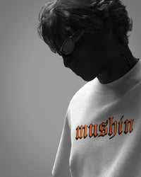 Mushin Panda unisex white oversized t-shirt front view with orange gothic typography